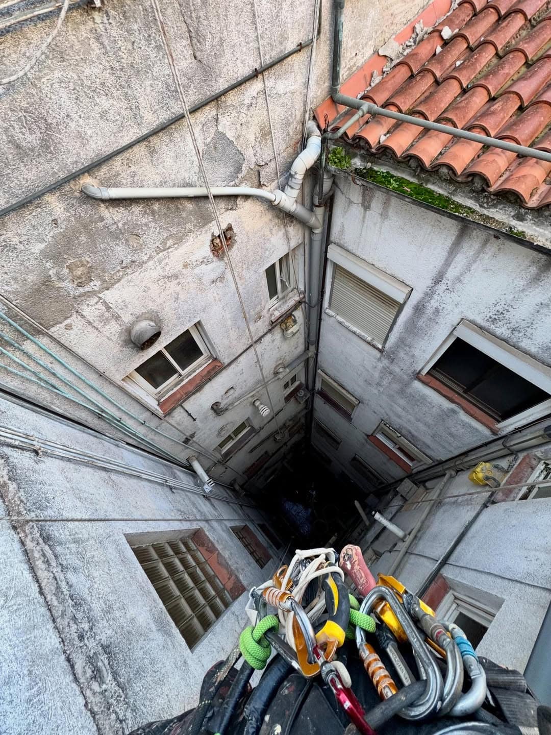 Rope Access to Inspect a Facade and Its Downspouts in Barcelona