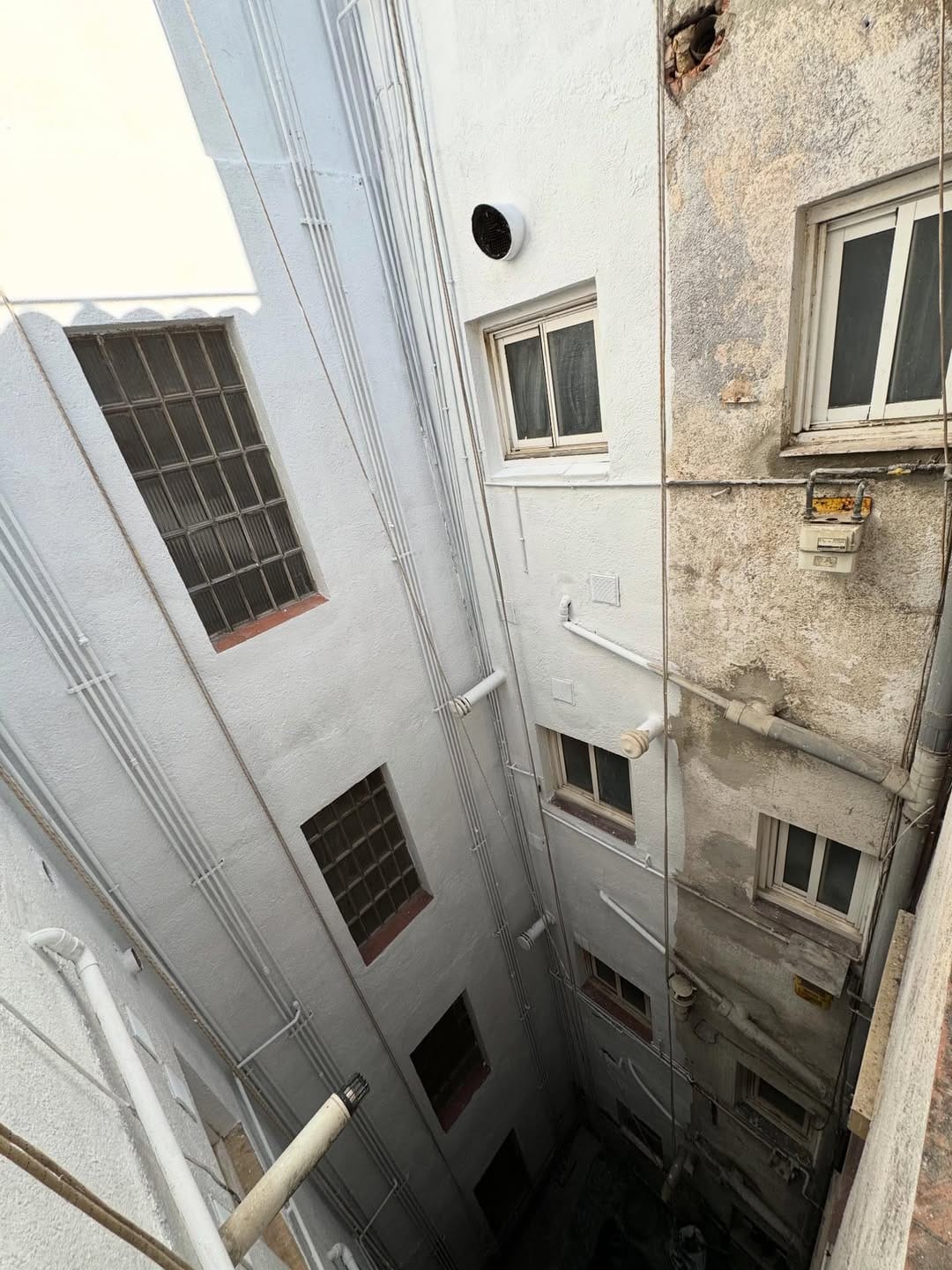 Inner courtyard before and after a high-altitude repair project