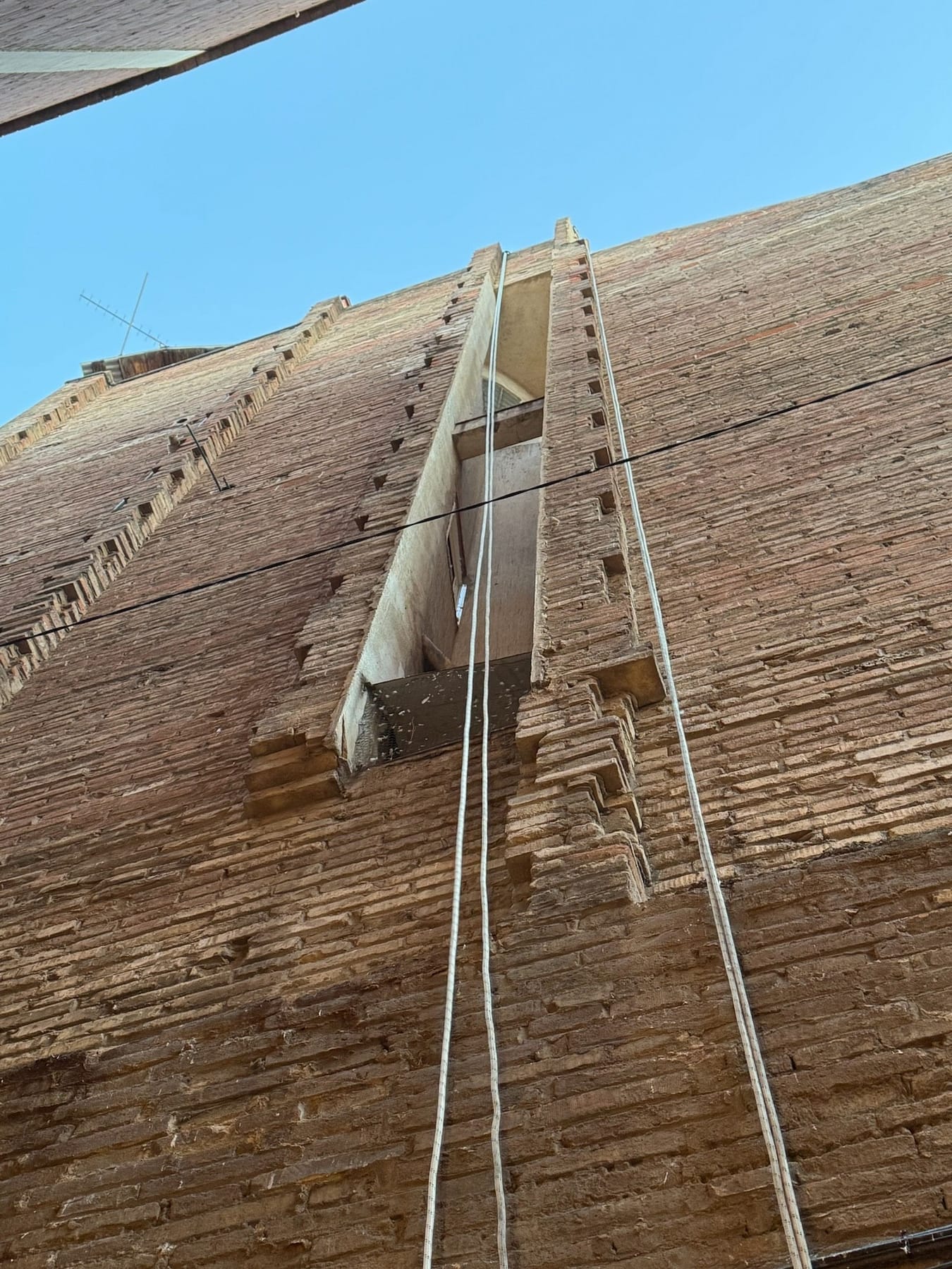 Vertical rope access on a building facade in Barcelona